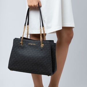 Brand new Michael kors black leather signature purse